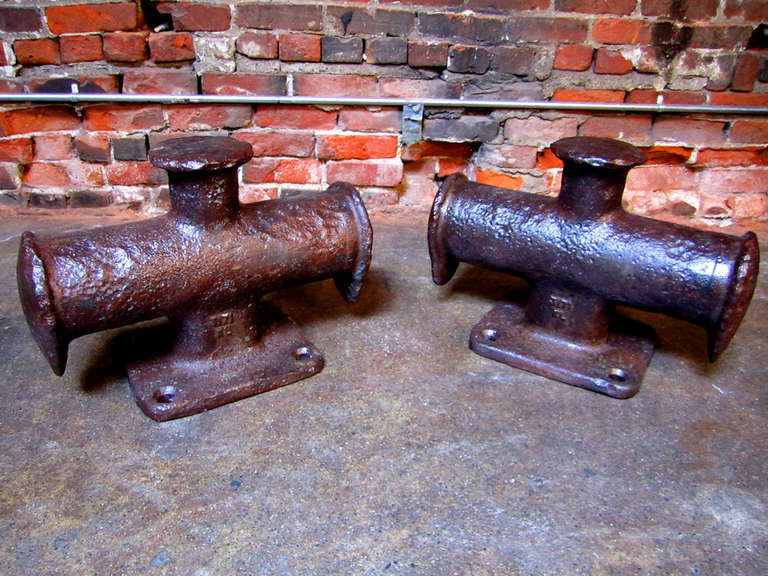 Cast steel dock cleats for large vessel.  Perfectly pitted from years of salt water exposure.  Restored to original cast iron surface, and meticulously finished.  Fantastic decor for a nautical enthusiast, perfect for retail display or great