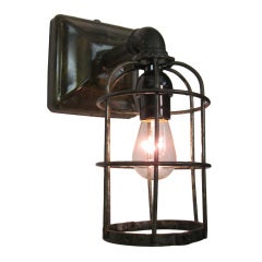 Vintage industrial cage wall sconce