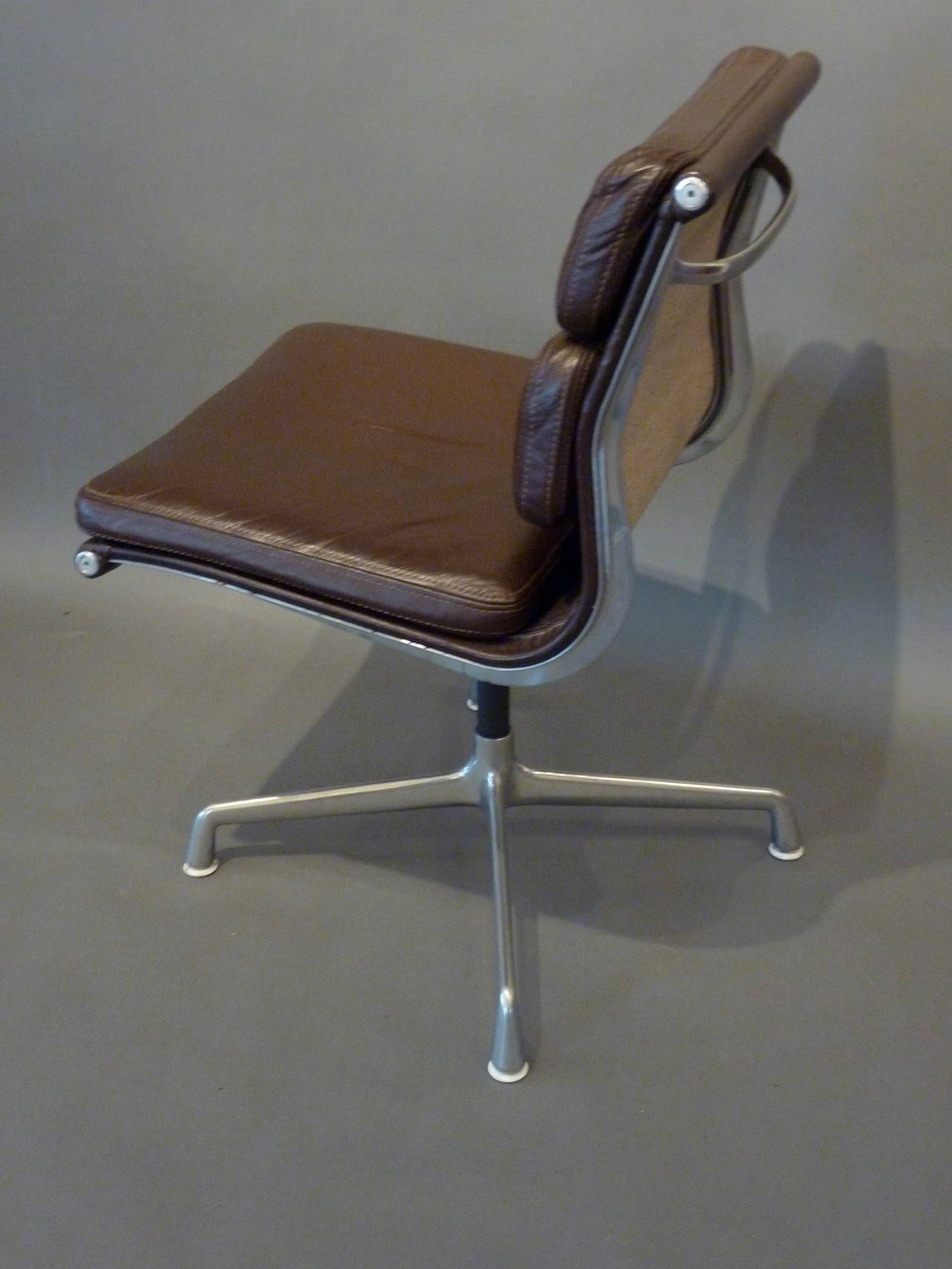 A 20th century Modern desk chair. Made of chrome with brown leather on a chrome swivel base. Extremely comfortable, designed by Herman Miller, 1977.