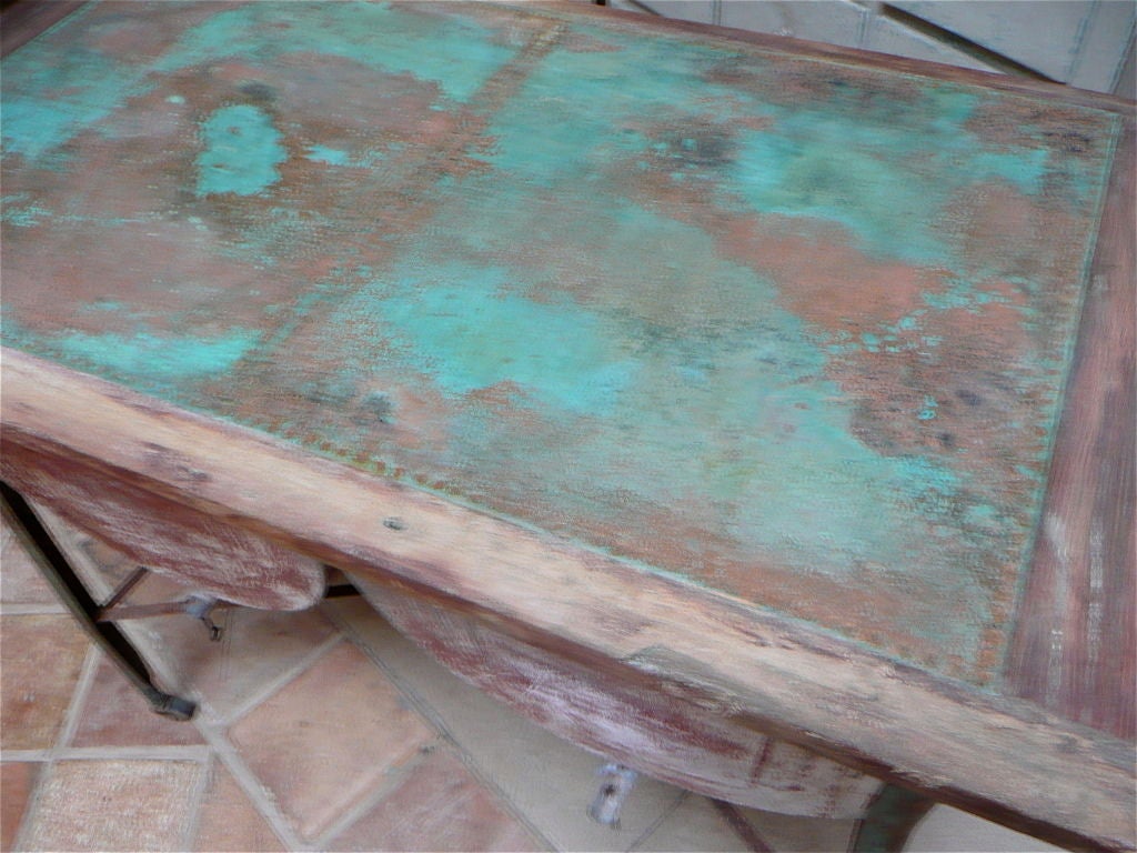 American Zinc and Copper Double Sink on a Stand. Made of zinc with old painted surfaces. Shaped metal legs with “X” stretchers and hinged copper top with the two sinks below for storage. Made in Virginia circa 1920.