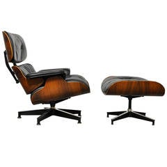 Vintage Rosewood Lounge Chair and Ottoman by Charles Eames