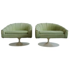 Pair of Jens Risom tulip base swivel lounge chairs