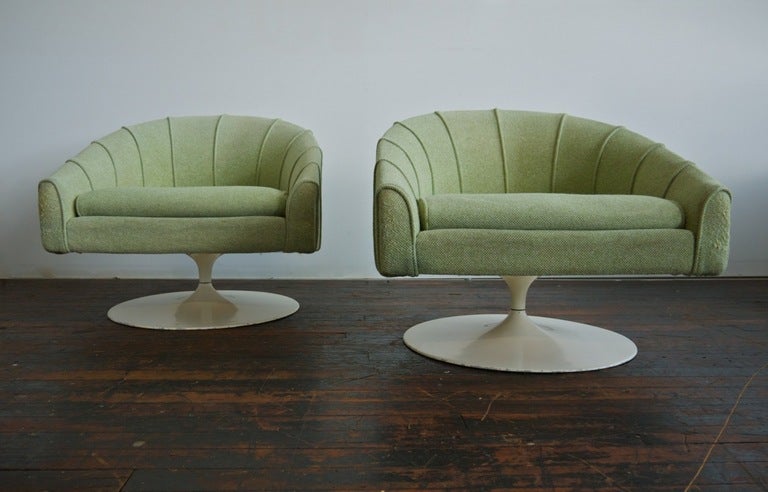 Wood Pair of Jens Risom tulip base swivel lounge chairs