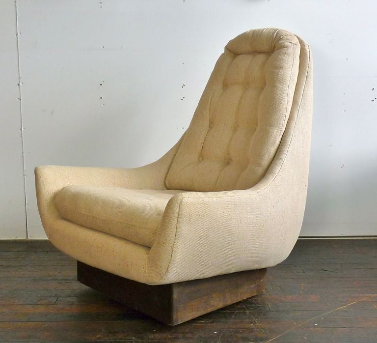 Unique high back swivel lounge chair.