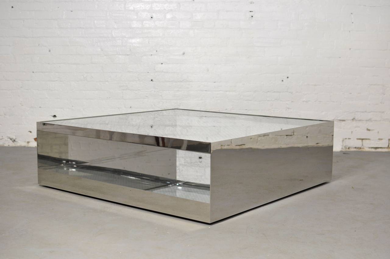 Joe D'urso low rolling coffee table. Manufactured by Knoll. Polished stainless steel with safety glass top.