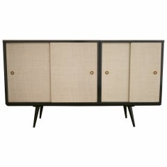 Vintage Credenza by Paul McCobb with Vitrolite glass tops.
