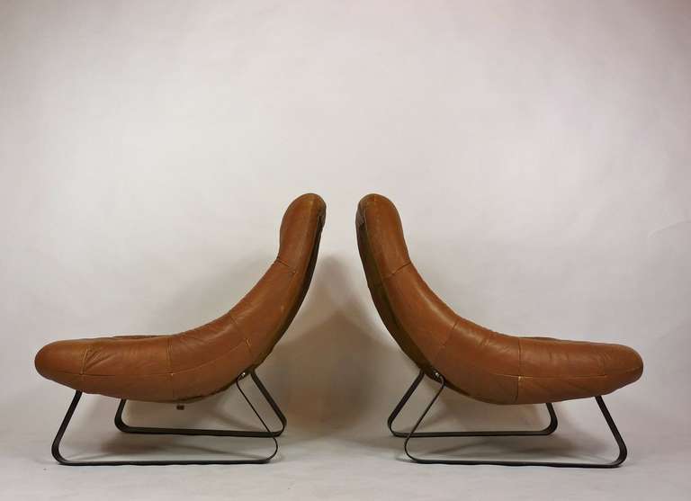 Pair of Percival Lafer leather lounge chairs. Single ottoman available.