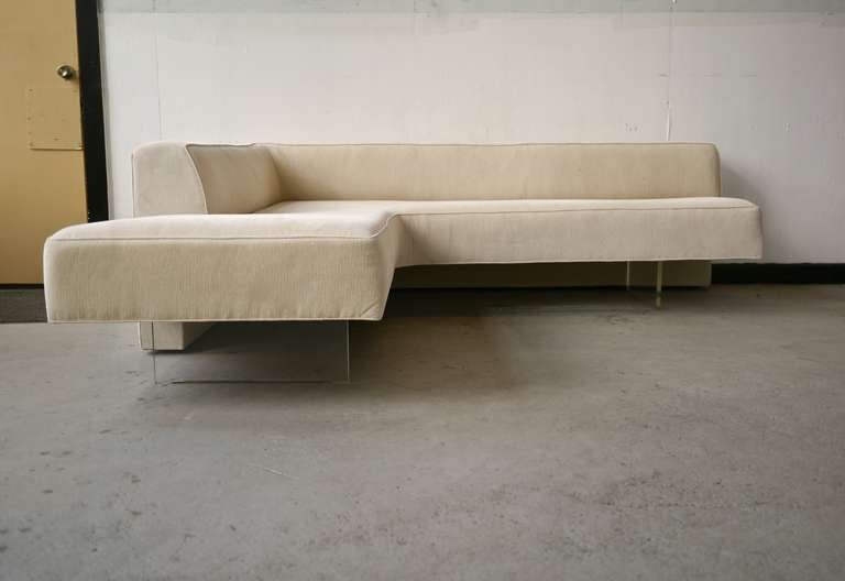 Vladimir Kagan Omnibus L shaped sofa on lucite legs. Matching pair of straight sofas also available.
