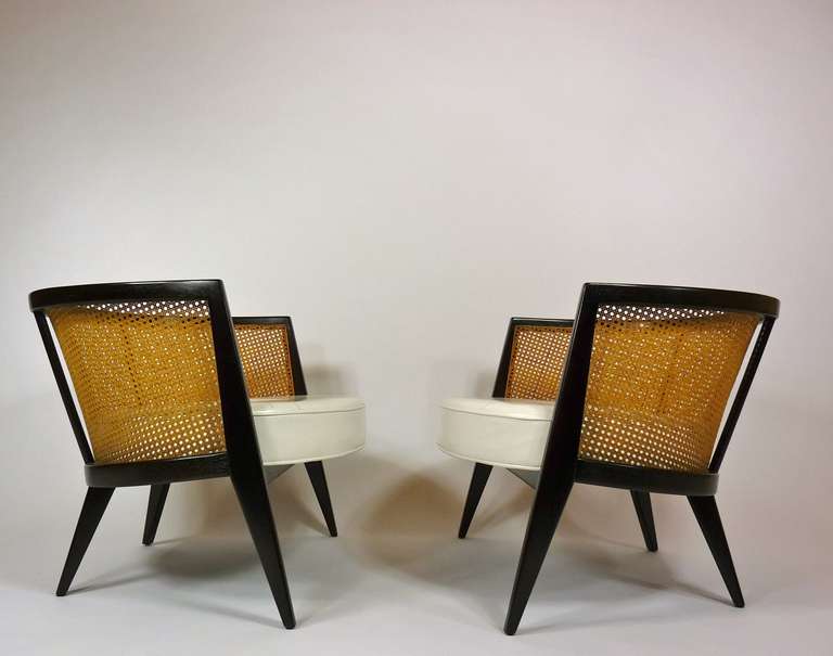 Harvey Probber cane back chairs with original leather.