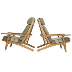 Pair of Wide Arm Lounge Chairs by Hans Wegner