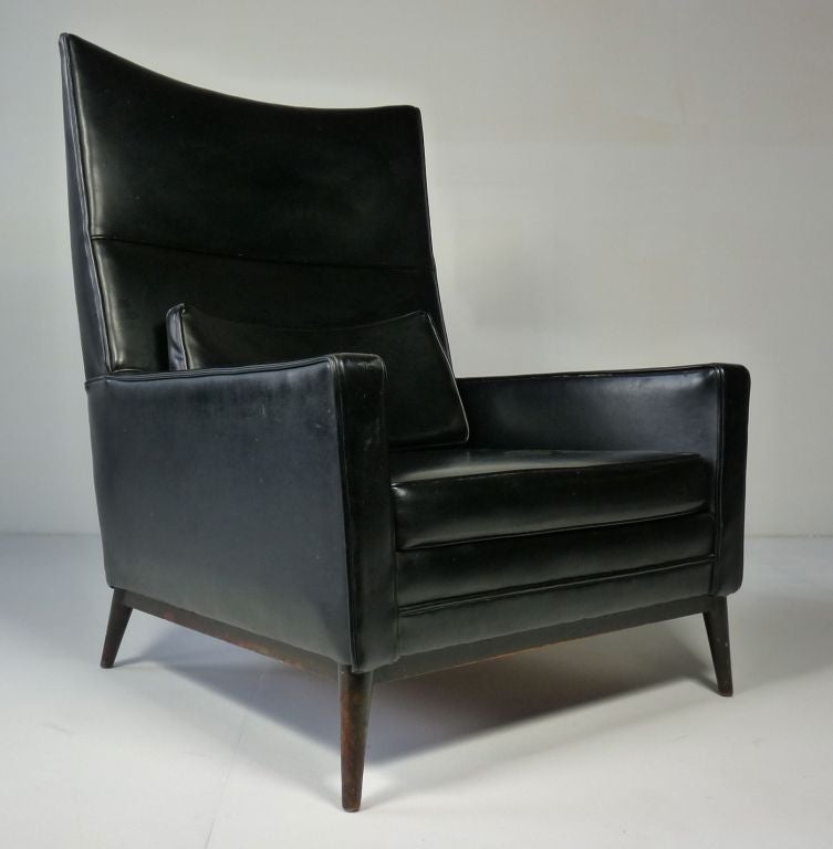 Rare highback sculptural Paul McCobb lounge chair.