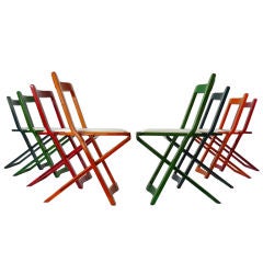 Set Of Eight Colorful Italian Foling Chairs