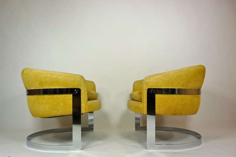 Milo Baughman curved lounge chairs.