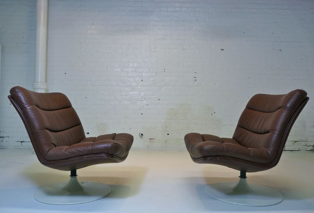 Swivel lounge chairs by Pierre Paulin. Low/small scale chair.