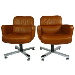 Pair Of Leather Swivel Chairs