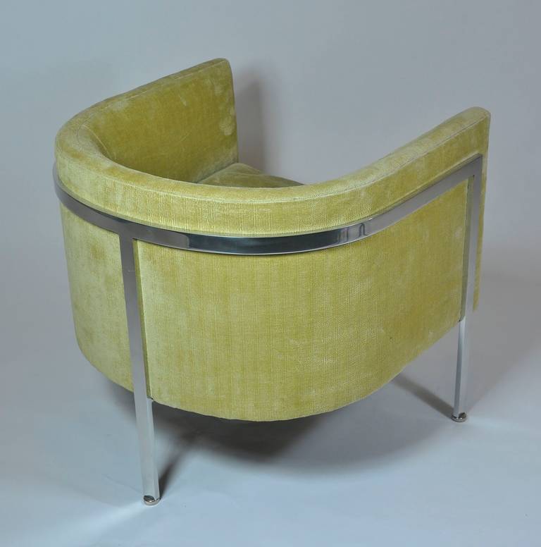 Harvey Probber chair. Polished three legged aluminum frame.