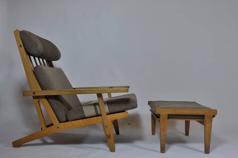 Danish Pair of Wide Arm Lounge Chairs and Ottoman by Hans Wegner