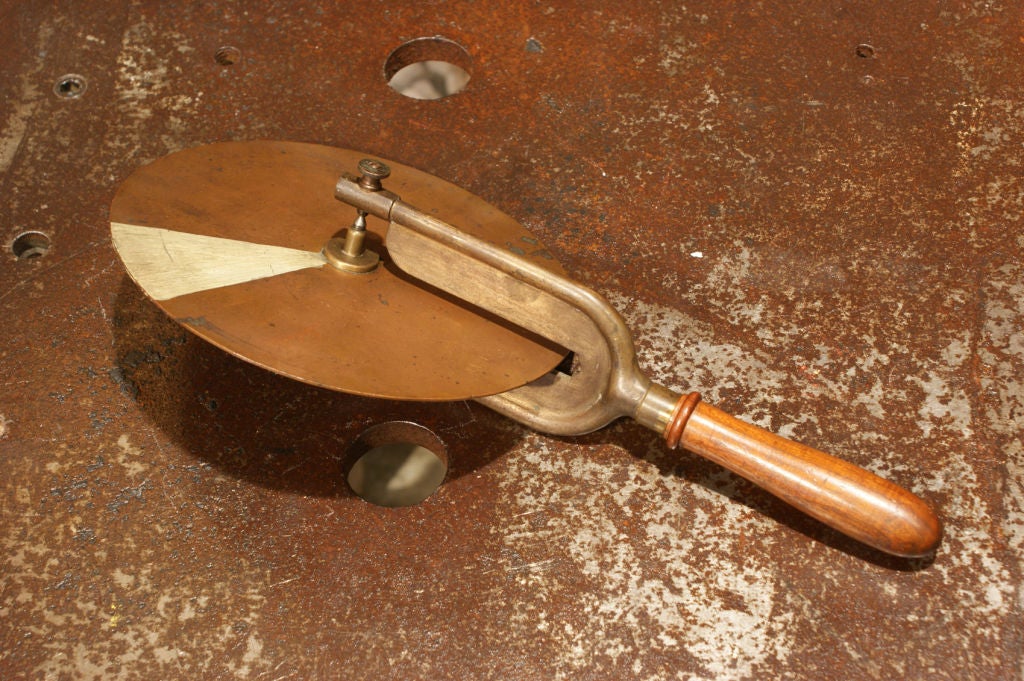 These educational wheels, with copper and black painted surfaces, were used by Physics teachers in the late 19th century. 

Please note we have two of these wheels available. One in copper with a white painted section and the other painted black