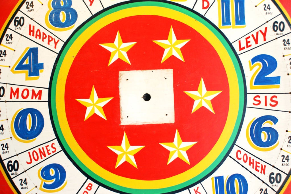 This brightly colored five-by-five foot plywood board was hand painted for a carnival wheel of chance game. The paint is very vivid and in great condition.