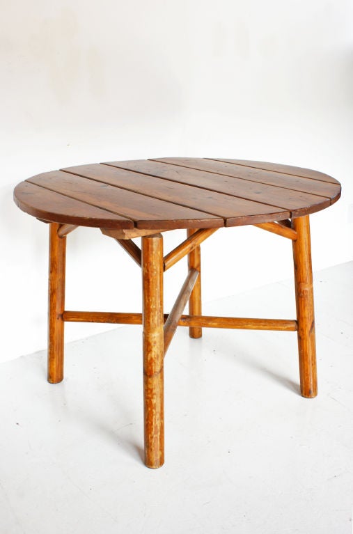 Great rustic log and plank summer camp lodge table from the Midwest. 



Table: 30" height - 42" diameter. 

Chairs: 35" height - 16" seat height - 18.5" x 18" seat.