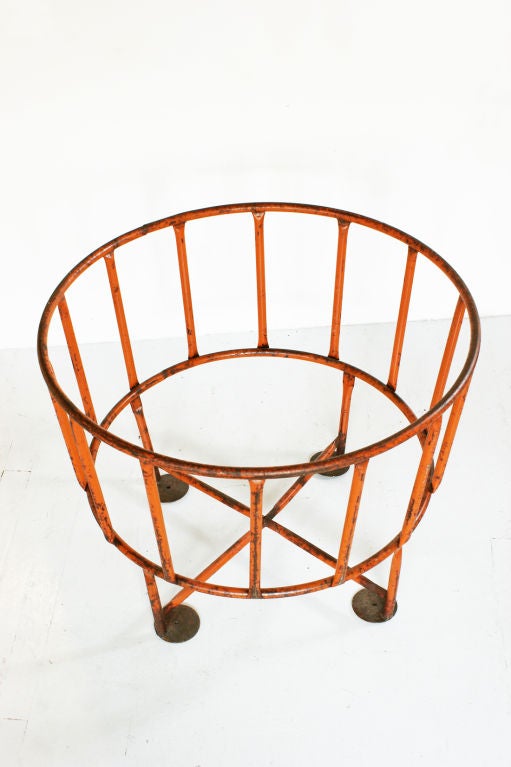 Unusual Industrial farm piece with fantastic orange paint. Makes a great table base.