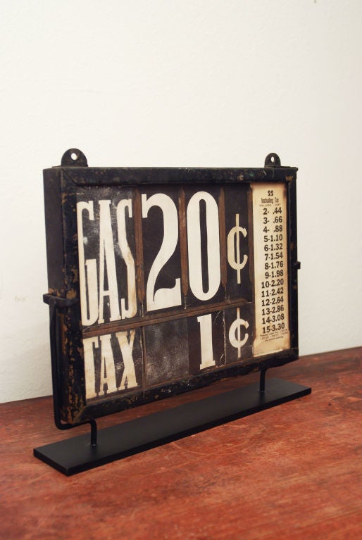 c. 1930's gas station sign presented on a custom museum stand. <br />
<br />
The Gas Tax of one cent per gallon went into effect with the passing of Hoover's Revenue Act of 1932.