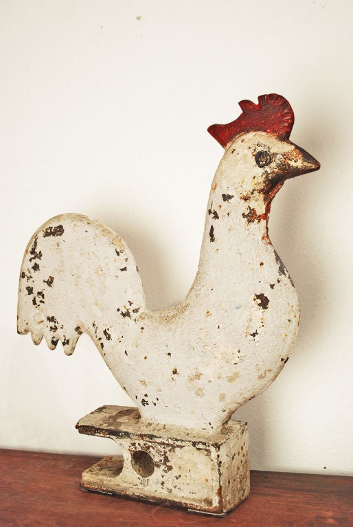 Late 19th century cast iron rooster windmill weight manufactured by the Elgin Wind Power and Pump Company of Elgin, Illinois. Excellent original paint surface.