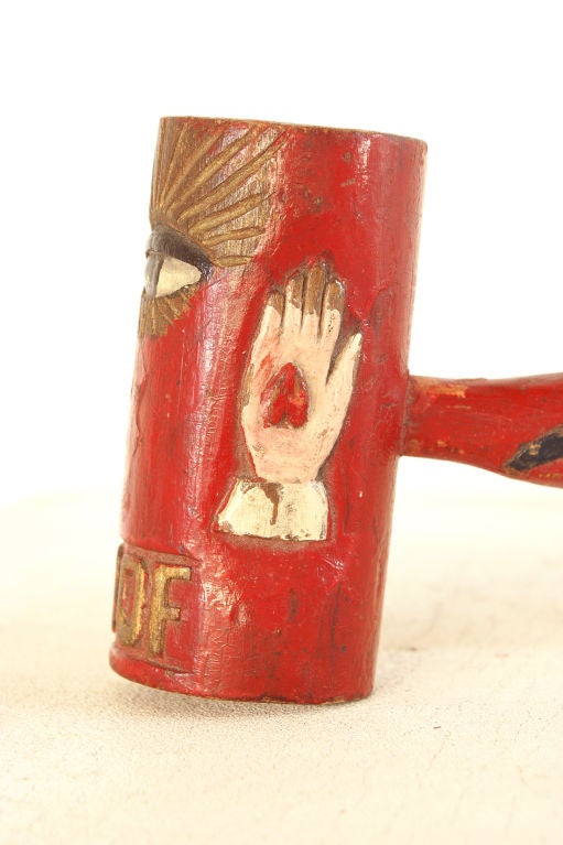 Beautifully carved and painted gavel from a International Order of Odd Fellows lodge in Spearfish, South Dakota.  <br />
<br />
Carved symbols include the all-seeing eye of God, a heart-in-hand (symbolic of charity), and a three link chain