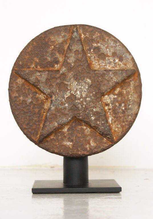 Original Flint & Walling Co. of Kendallville, IN double-sided round star windmill weight. Traces of original paint surface. Found in Nebraska.