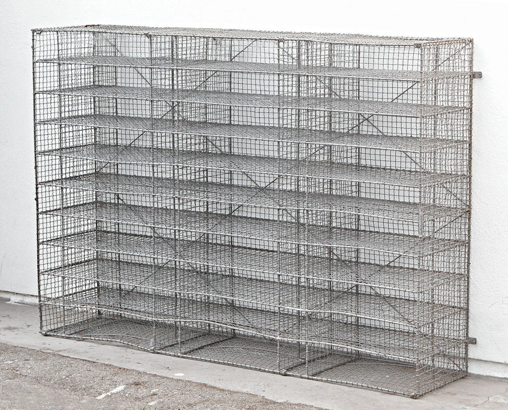 Large Industrial partitioned wire cage. Perhaps originally for equestrian tack storage. Would be perfect for storing wine, with storage for approximately 150 bottles.