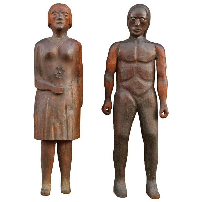 Figures d'art populaire en bois sculptées à la main