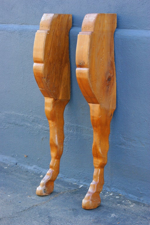 This pair of giant sculptural wooden horse legs, at 5 ft. tall, was once part of a large mantel at the home of a horse ranch in Kentucky. Said to have been Amish carved.