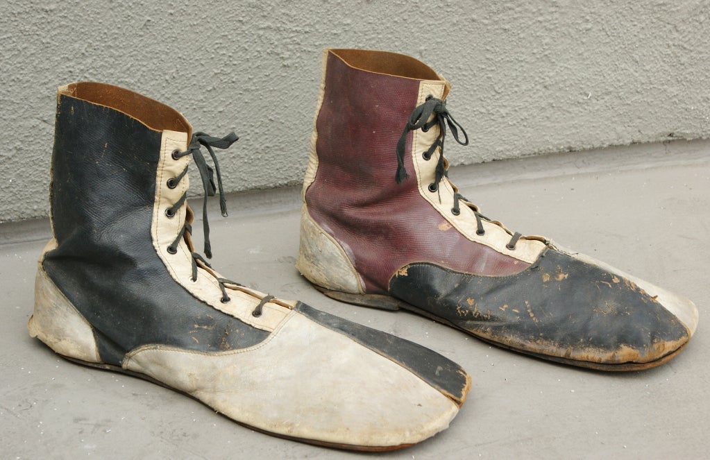 Fantastic early pair of clown shoes in black, white, and burgundy leather.
