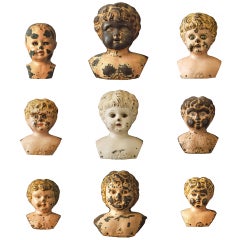 Collection Of Graduated Tin Doll Heads