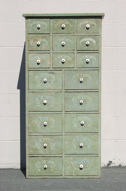 Functional general store herb and spice apothecary drawers found in New Hampshire. All dovetailed and hand stenciled drawers with handwritten notes on the inside for measurements and pricing. Each drawer has a hand stenciled painted banner/ribbon