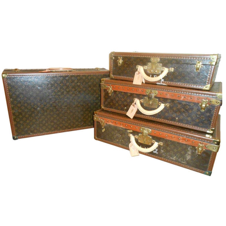 Authentic Louis Vuitton Set of Four Suitcases For Sale at 1stDibs