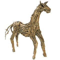 Cheval sculpté en bois de teck