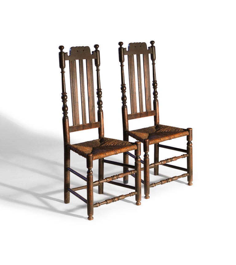 With great old patina, these sidechairs have scalloped crest-rails, great turnings on the stiles, and front stretchers.
