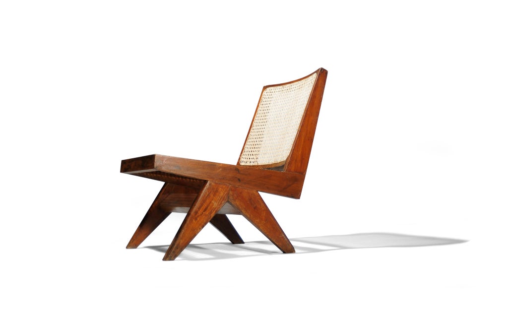 Rare teak easy chair with caned seat and back, flared V-Type legs and rectangular stretchers. Has markings. Designed by Pierre Jeanneret (1896-1967). Chandigarh, India, c. 1958.  Le Corbusier Pierre Jeanneret: The Indian Adventure,