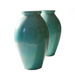 Pair of Galloway Glazed Urns with Excellent Verdigris Patina