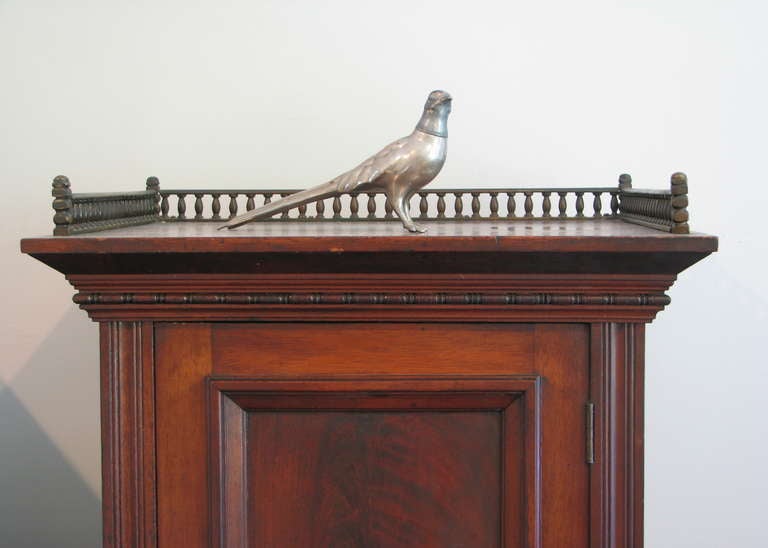 Unusual Walnut Plantation Writing Desk
Incredible form and proportion. Beautiful worn linen velvet desktop and two pull-out writing trays. Brass knobs, pulls and 