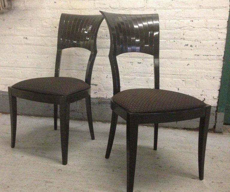Set of eight spectacular and stylish signed Mid-Century Modern dining side chairs, very chic.  These chairs are now on sale for a clearance price.