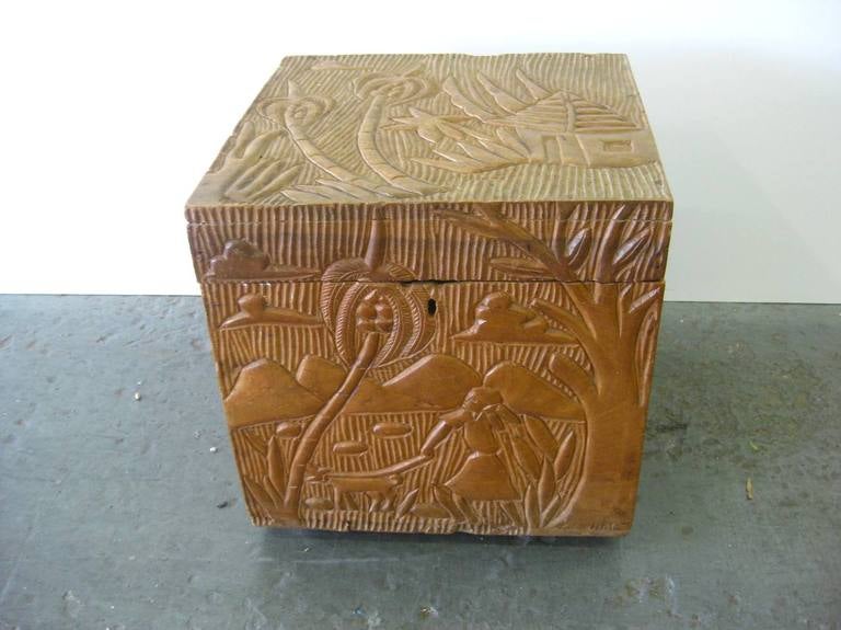 Superbly hand-carved on all five sides treasure box? Small hope chest, outstanding relief give this beautifully carved signed box from Haiti a great decorative object of interest look.