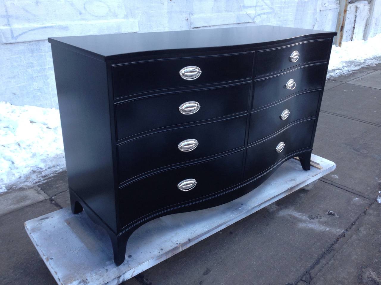 Serpentine Eight-Drawer Black Dresser