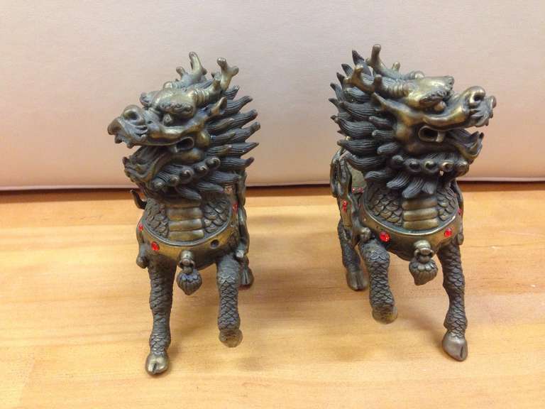 Pair of artisan bronze female and male anatomically correct Chi Lin Feng Shui Guardians adorned, will discount accordingly, makes a great gift.  Discounted due to missing stones, also due to liquidation of old inventory these pieces are now on sale