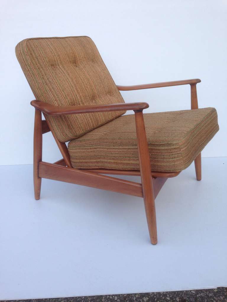 Rare recliner lounge chair by Johnson furniture company in the style of Finn Juhl, distributed and sold by John Stuart, wood fully refinished and in excellent condition,  this item is on sale for a clearance price and Upholstery can be done for