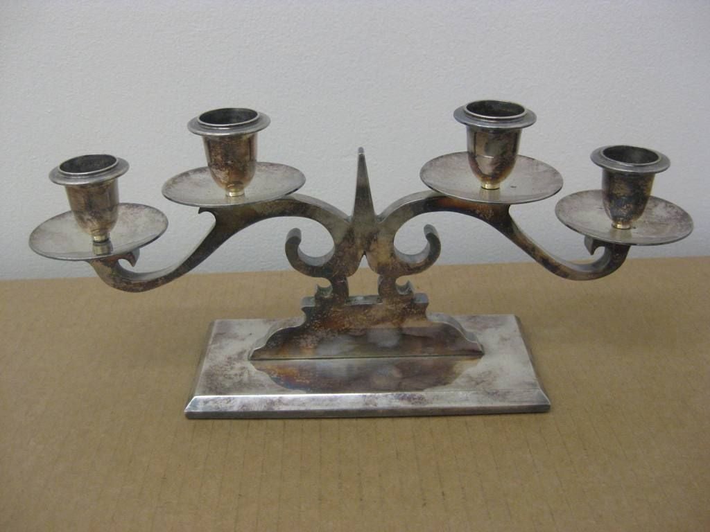 Regency antiqued silver candelabra, this candelabrum has four individual candle holders.