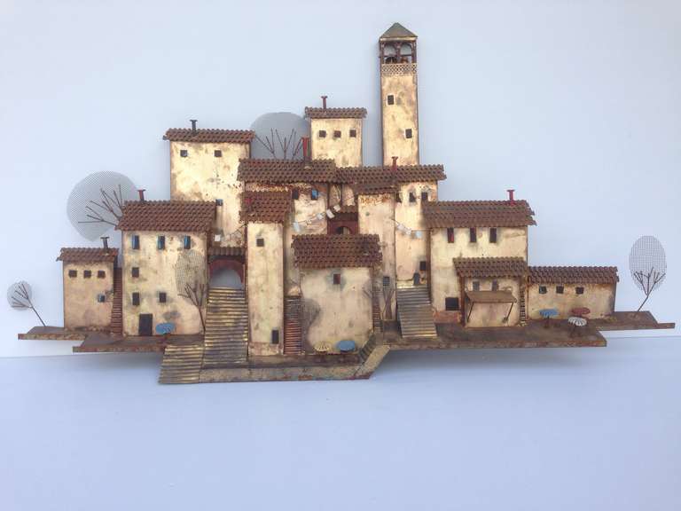 Curtis Jere wall mount sculpture of European Village, complete with cloth lines, umbrella and tables, church tower and working bells, makes a great gift for a cottage or a summer home.