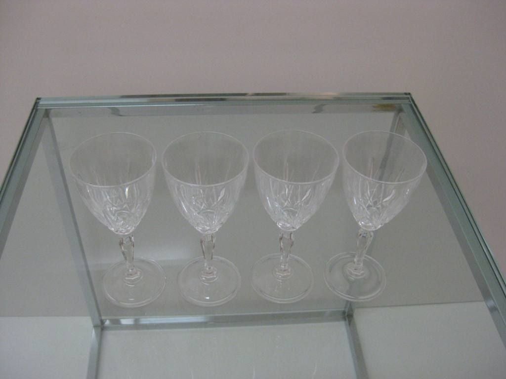 Set of four crystal glasses, please also visit sjulian.1stdibs. To see most of our collection, this item is on sale for a clearance price.