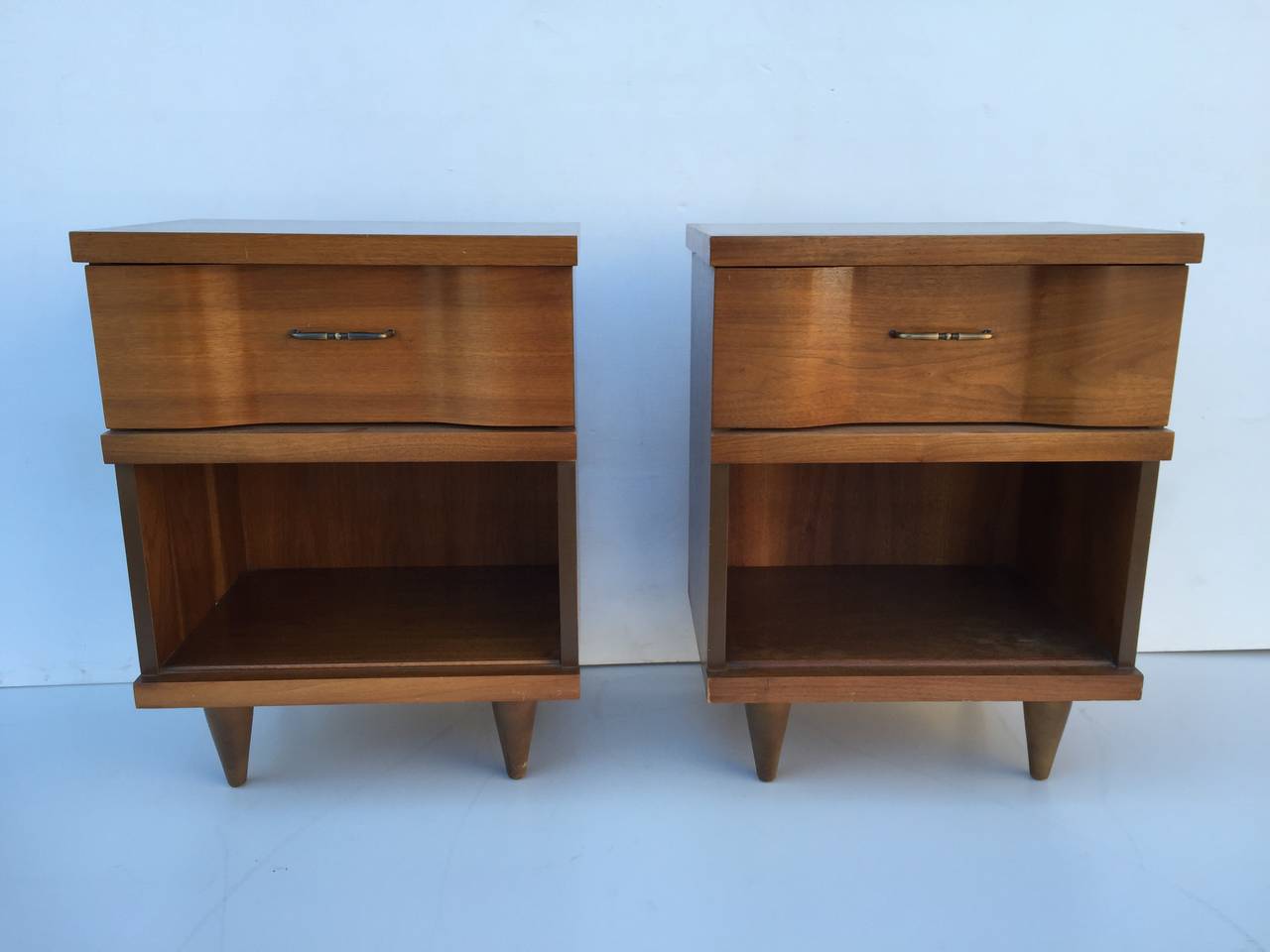 Pair of Serpentine Night Stands by Widdicomb. 
.